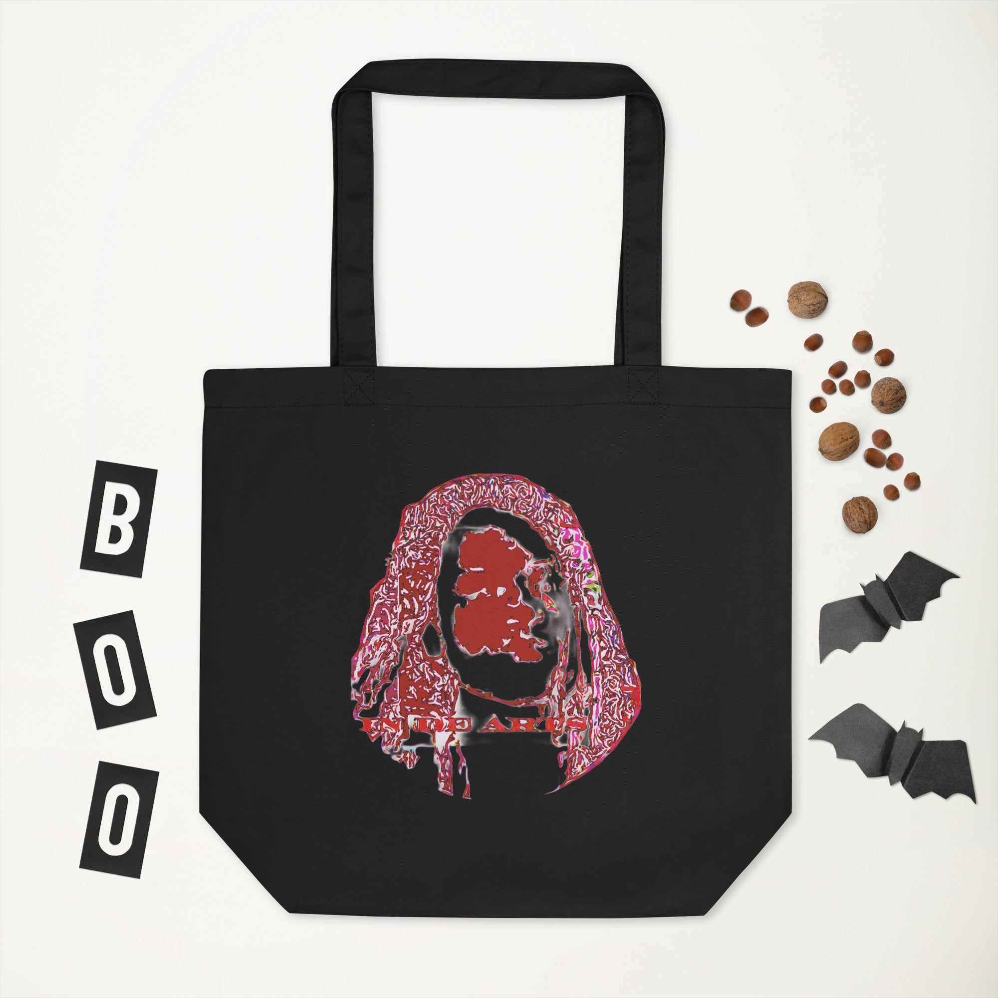 Black tote bag with a colorful design and 'BOO' text on a white background